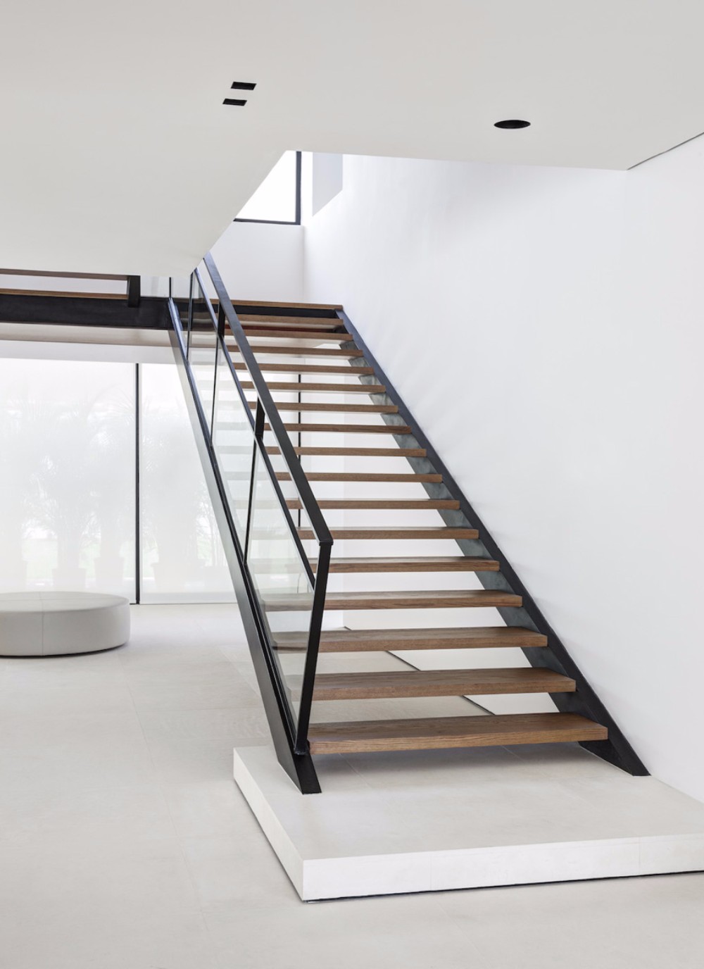 Minimalist Interior Design by VSHD Design with Mid-Century Lamps