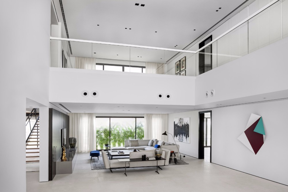 Minimalist Interior Design by VSHD Design with Mid-Century Lamps