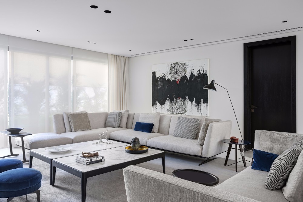 Minimalist Interior Design by VSHD Design with Mid-Century Lamps